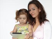 motheranddaughterwithtouchpad_34009348.jpg